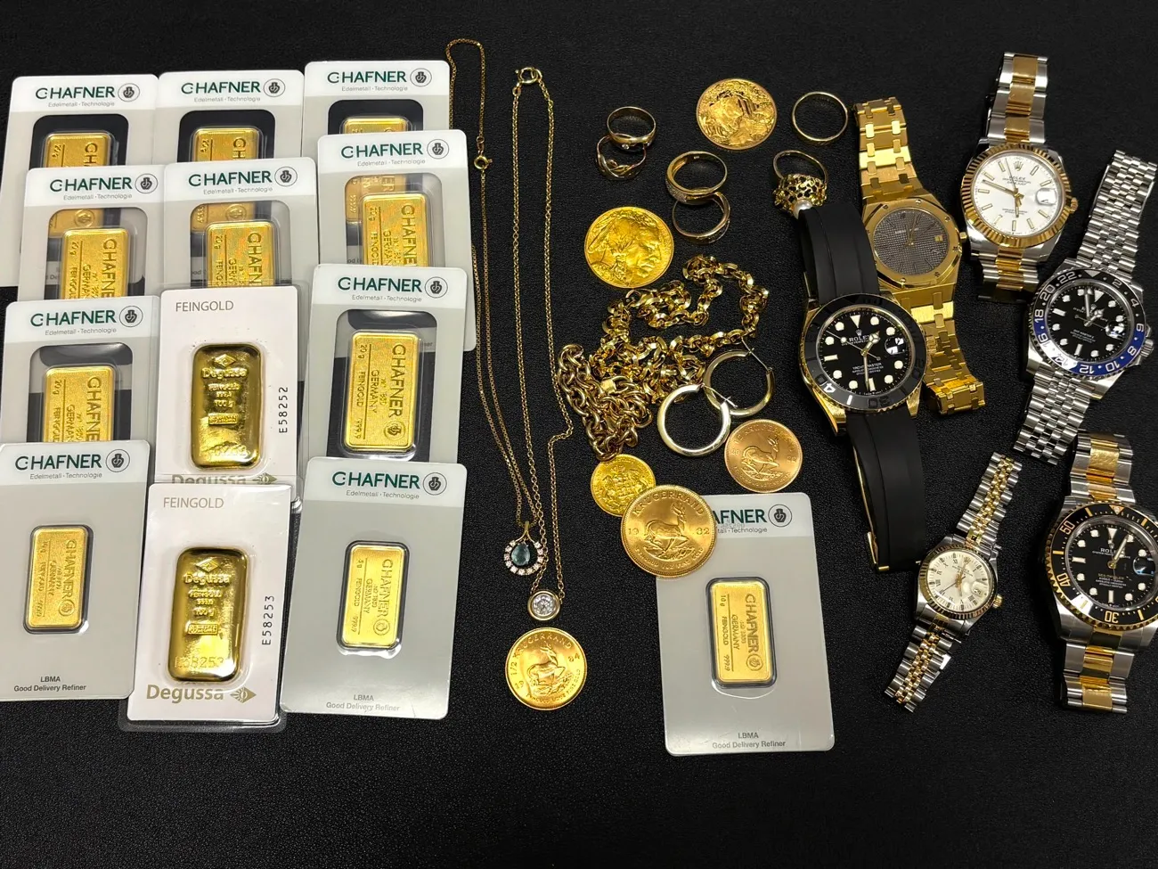 Rolex-Uhren, Goldbarren und Goldmünzen