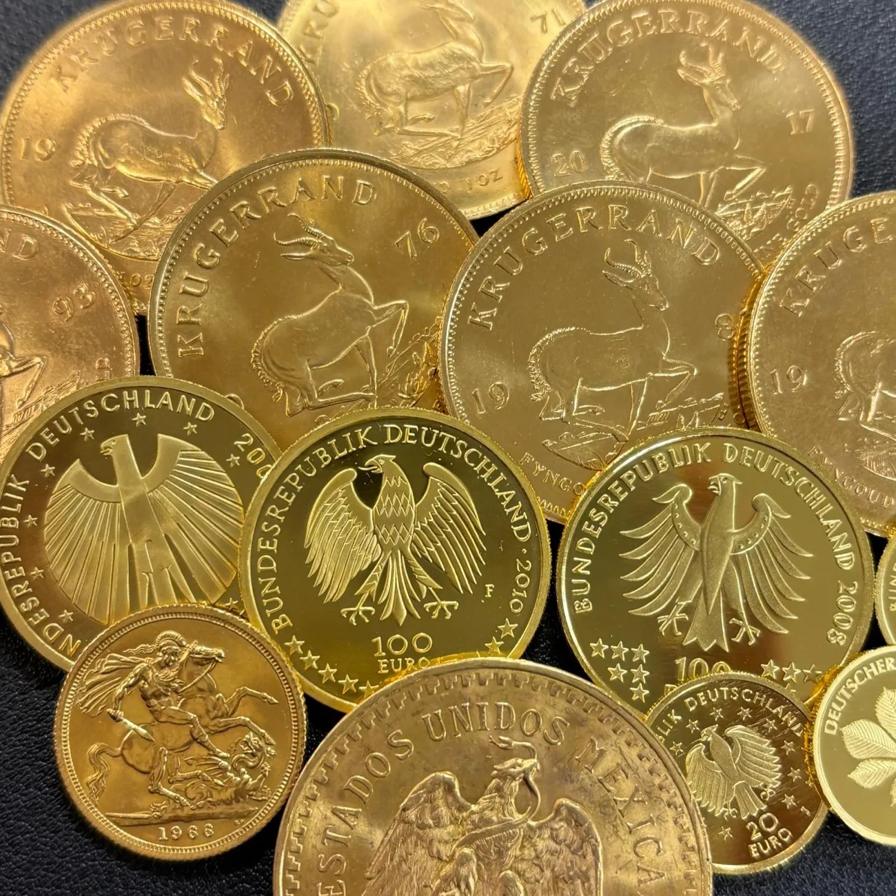Goldmünzen: Krügerrand und 100-Euro-Goldmünzen