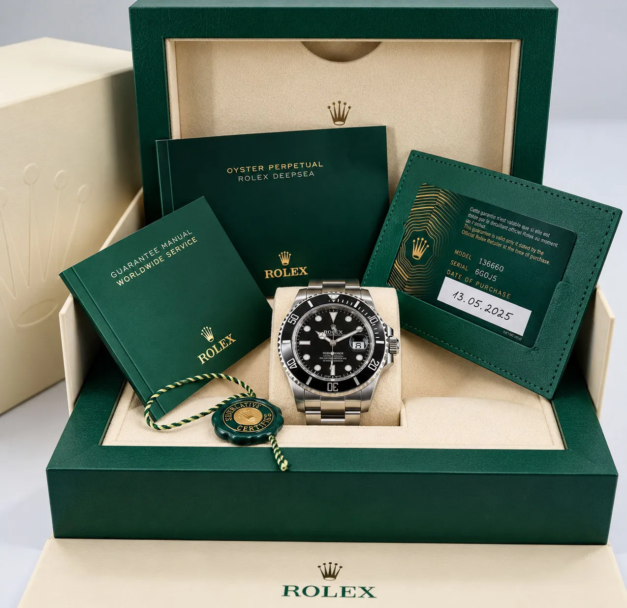 Rolex Submariner in grüner Originalbox mit Garantiekarte und Booklets